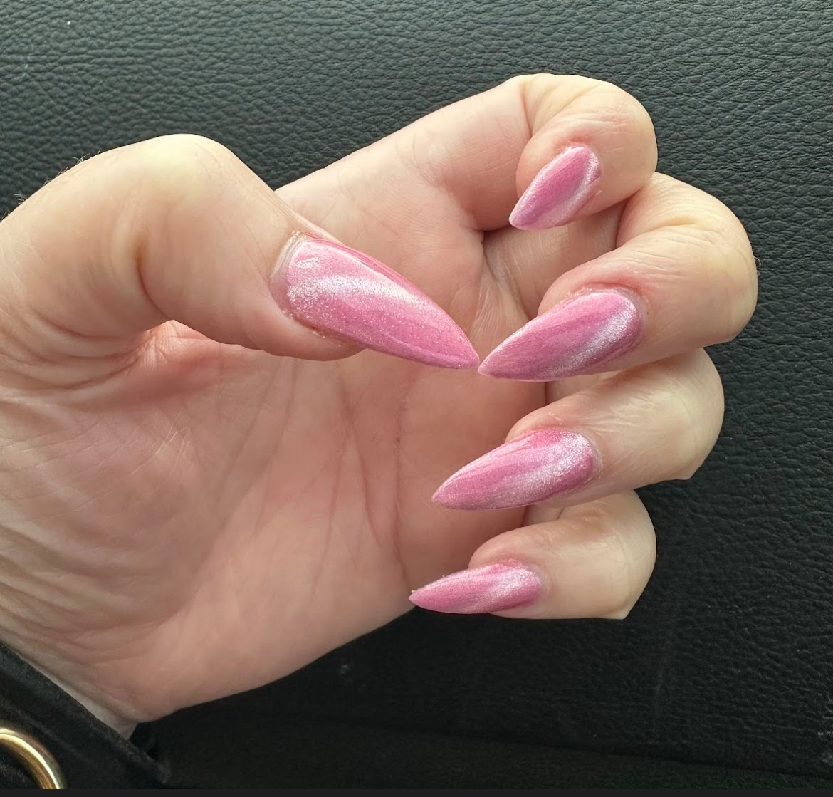 Pink chrome stiletto nails