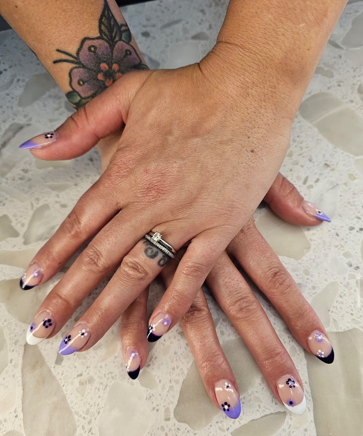 Lilac and black french tip floral nails